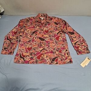 C.L.O.T.H.E.S. silk long sleeve top in a  women's medium.  NWT